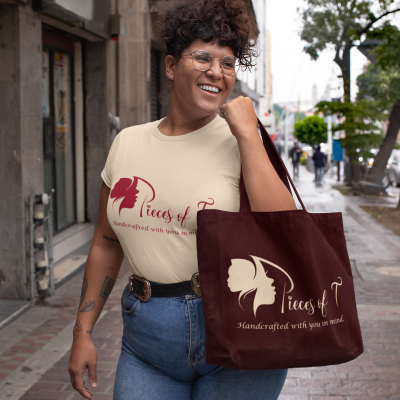 plus-size-t-shirt-mockup-of-a-woman-with-tattoos-holding-a-tote-bag-on-the-street-30890